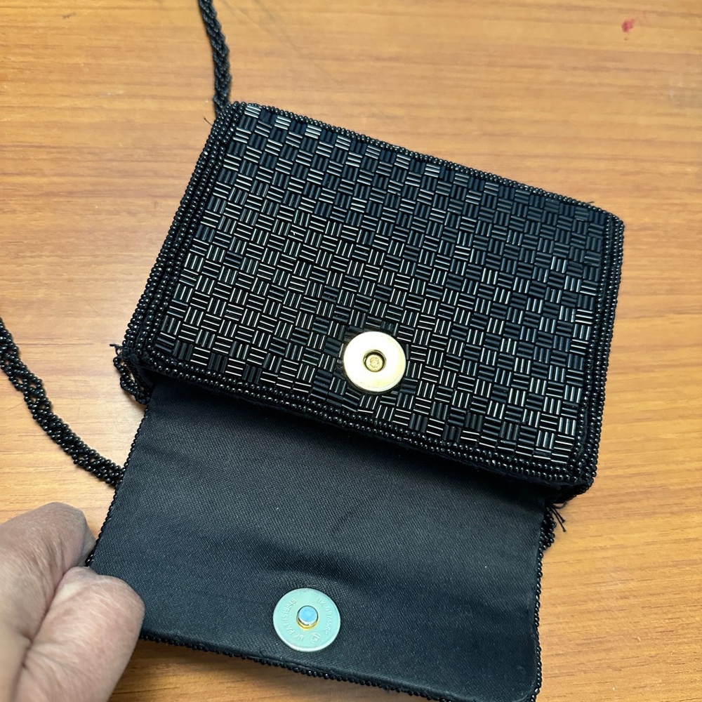 Black Textured Crossbody Bag with Flap Closure